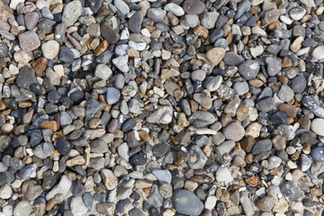 Pebbles at the beach background