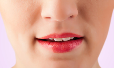 Fototapeta premium Beautiful woman red lips close up
