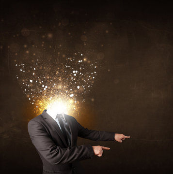 Business man with glowing exploding head