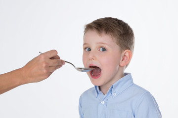 sick male kid on isolated background
