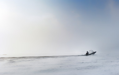 Traveling to Myanmar, outdoor photography of fisherman on tradit