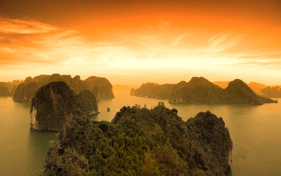 Sunset sky and mountains rocks of Halong Bay Vietnam
