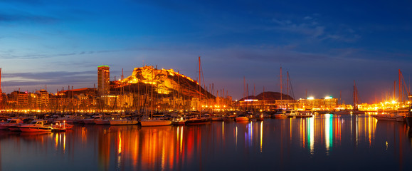 Fototapeta na wymiar Panorama of port with yachts in night. Alicante