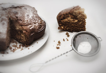 Honey cake with sugar powder