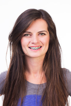 Female with braces smiling