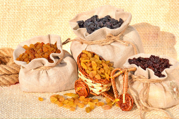 Assorted raisins in the bags on the sacking