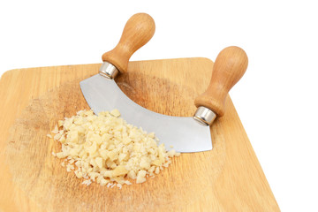Finely chopped macadamia nuts with a rocking knife