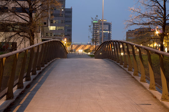 Modern bridge leading from the city to the business center