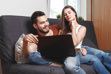 couple with laptop