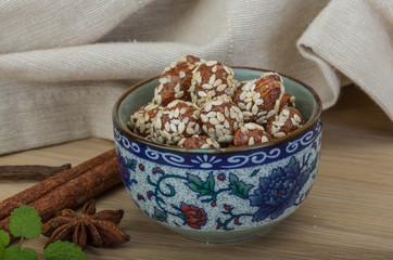 Peanut in honey with sesame seeds