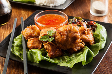 Fried chicken pieces in batter