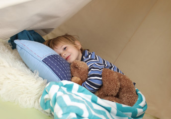 Child Taking a Nap, Resting in a Play Tent