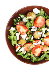Eggplant salad with tomatoes, arugula and feta cheese, isolated