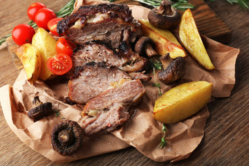 Delicious grilled meat on table