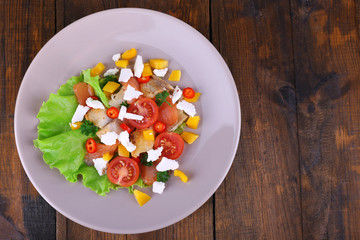Fresh fish salad with vegetables