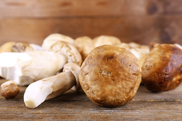 Wild mushrooms on wooden table
