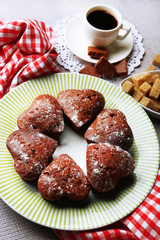 Homemade chocolate cupcakes on table