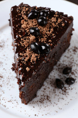 Yummy chocolate cake served on table, close-up