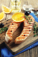 Grilled salmon  and orange slices