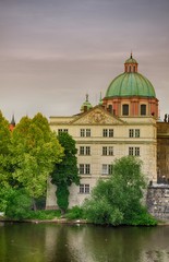 Fototapeta na wymiar The building on the banks of the Vltava River. Prague. Czech Rep
