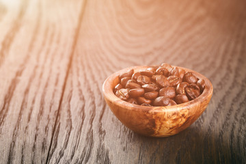 freshly roasted arabica coffee beans in bowl
