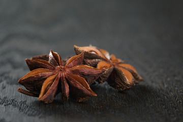 anise stars on old oak table
