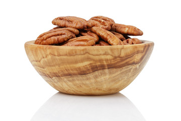 pekan nuts in wood bowl