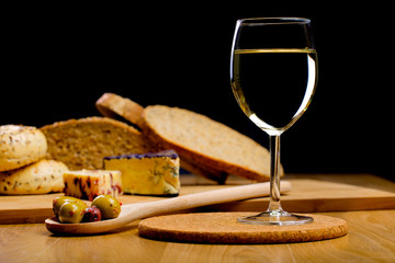 Glass of wine and cheese