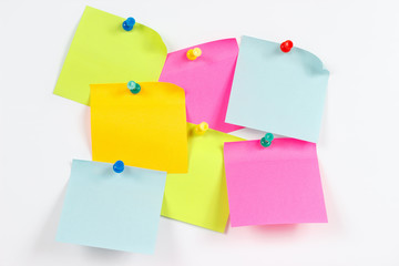 Colorful stickers on a white message board