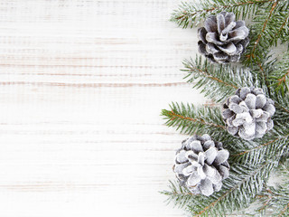 Christmas background with decoration with cones and twigs