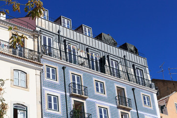 House facade with blue Azulejo tiles in Lisbon