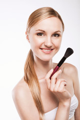 Beauty Girl with Makeup Brush