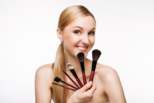 Beauty Girl with Makeup Brush