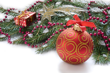 Christmas red ball, twig of fir , beads and star