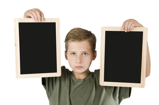 Boy between two black boards middle