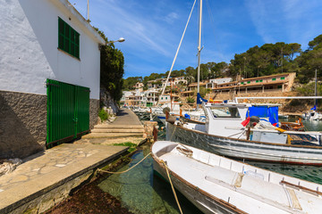 Fototapeta na wymiar Boats anchored in port of fishing village Cala Figuera, Majorca