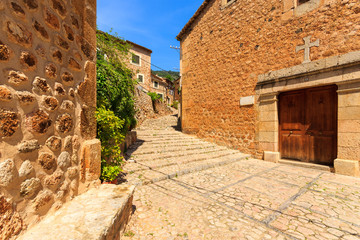 Traditional stone houses on street in Fornalutx village, Majorca