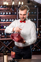 Sommelier in the wine cellar