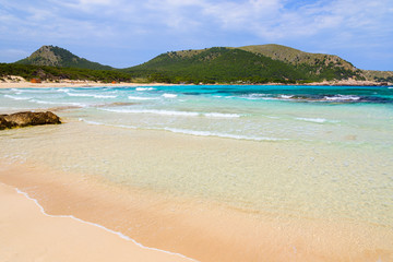 Obraz premium Waves sea water beach sand, Cala Agulla, Majorca island, Spain