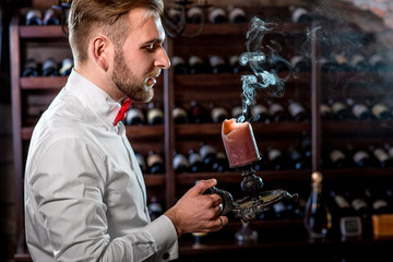 Sommelier in the wine cellar