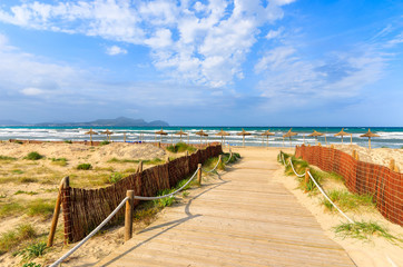 Path to sandy Can Picafort beach, Majorca island, Spain