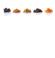 Obraz premium Mix dried fruit variety over white background
