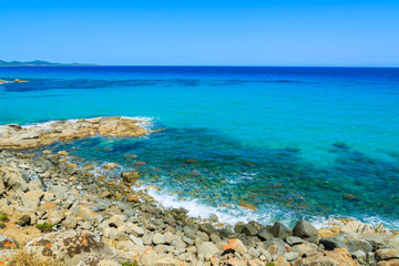 Fototapeta na wymiar Rocks and sea on coast of Sardinia island near Peppino beach
