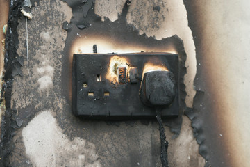 fire damaged electrical socket