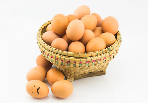 eggs in basket on white background