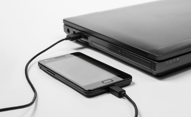 Smartphone charging power from a laptop