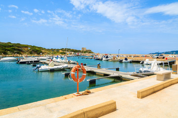 Fototapeta na wymiar View of Porto Giunco port with sailboats and yachts, Sardinia