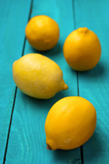 Lemons on the bright cyan background