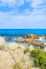 Rocks in sea on sunny day, Porto Giunco bay, Sardinia island