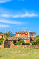 Traditional holiday villa houses on Capo Boi beach, Sardinia